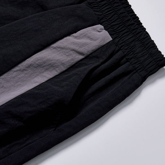 英文标题：Custom Logo Reflective Piping Contrast Color Windbreaker Fabric Unisex Elastic Waist Straight Cargo Pants Streetwear Casual Racing Track Trousers Daily Outer Bottoms