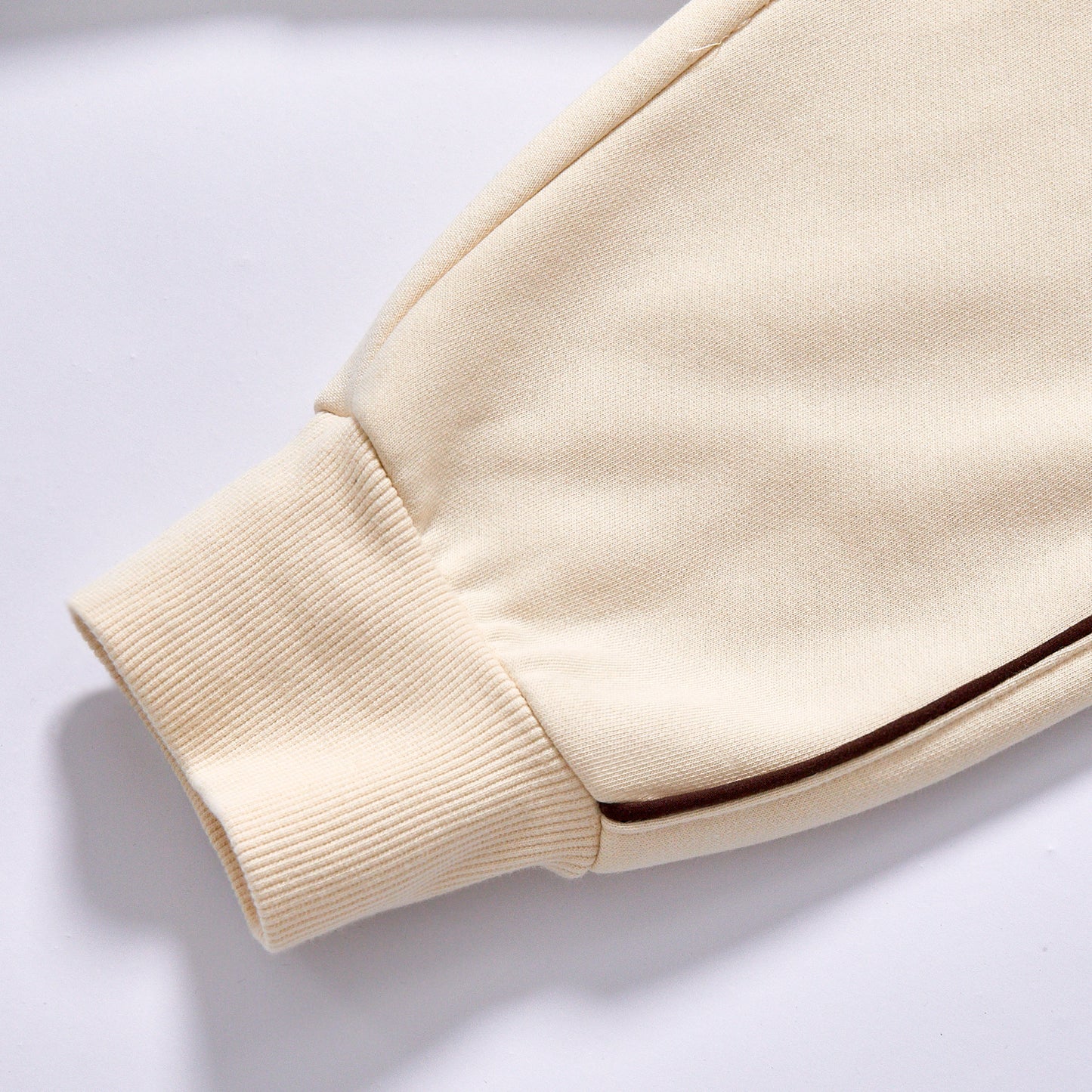 Custom logo bulk wholesale irregular cut bottom casual fleece sweatshirt drop shoulder relaxed fit unisex loose cream fleece top daily outfit