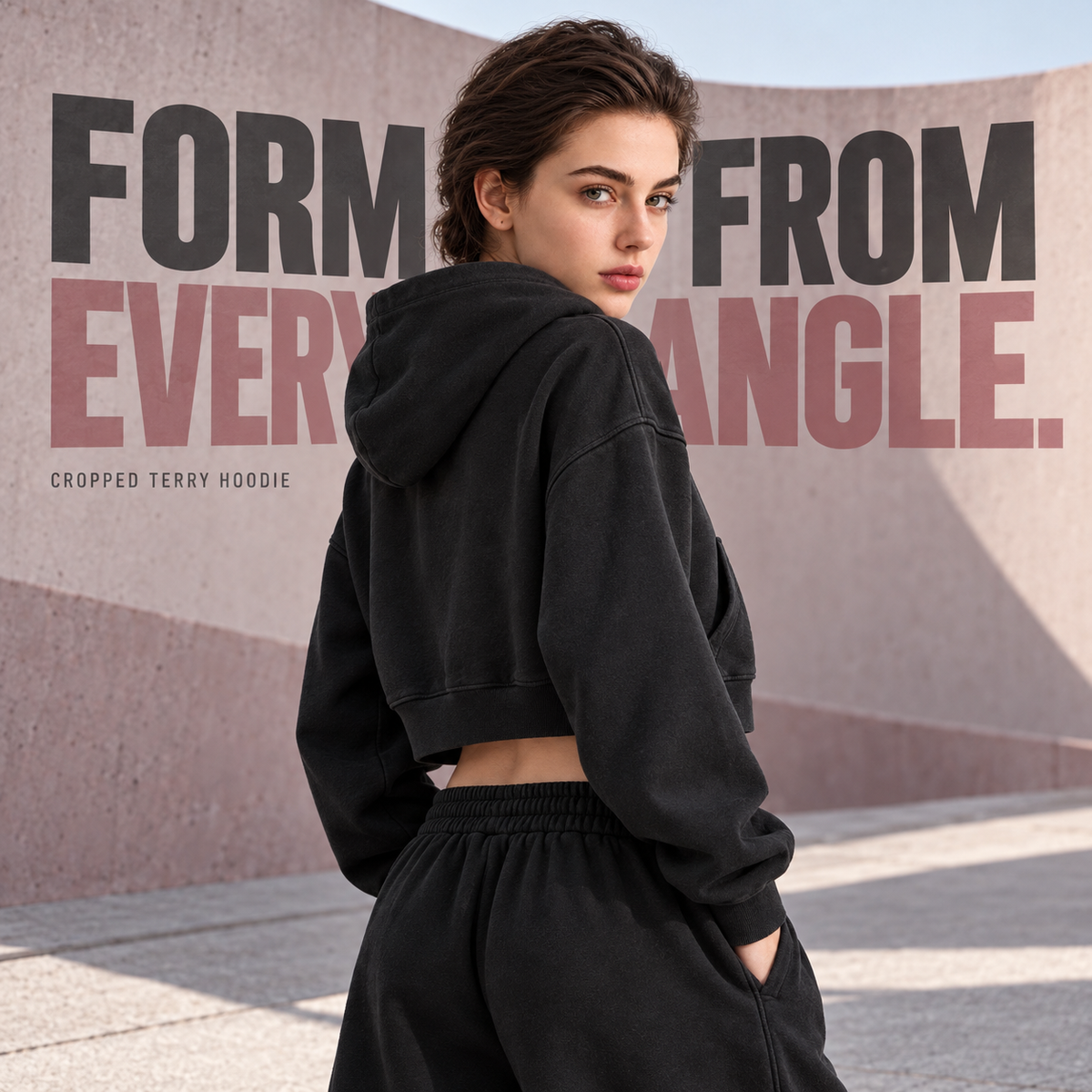 A10552 Black women's cropped terry pullover hoodie, rear or three-quarter styling view