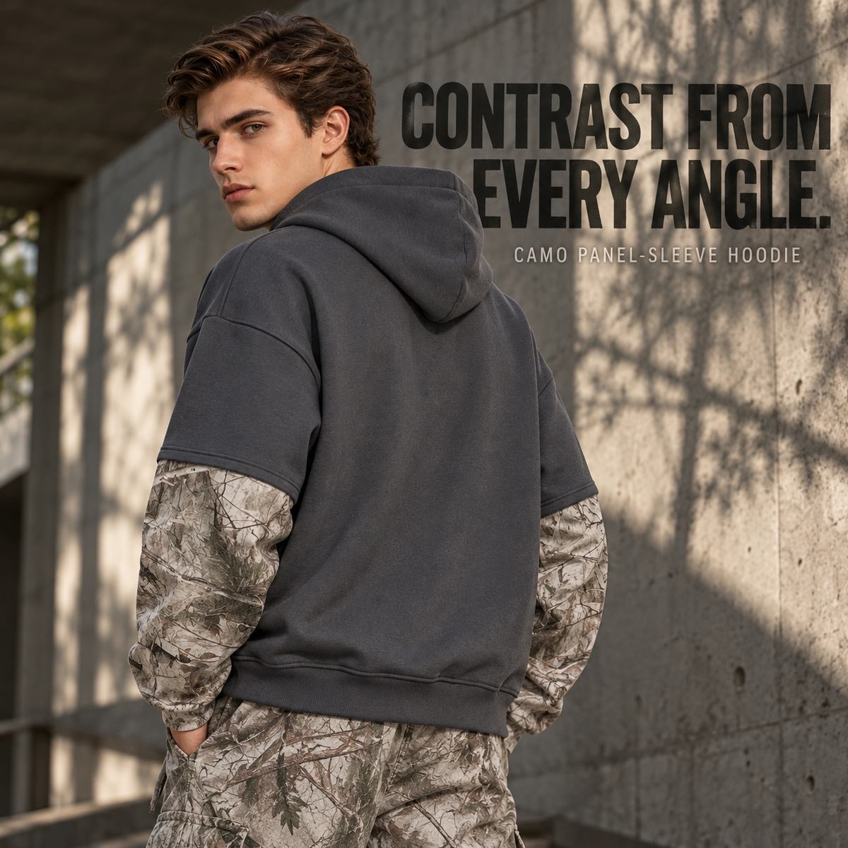 A36552 Dark Grey layered camo-sleeve fleece hoodie, rear or three-quarter styling view