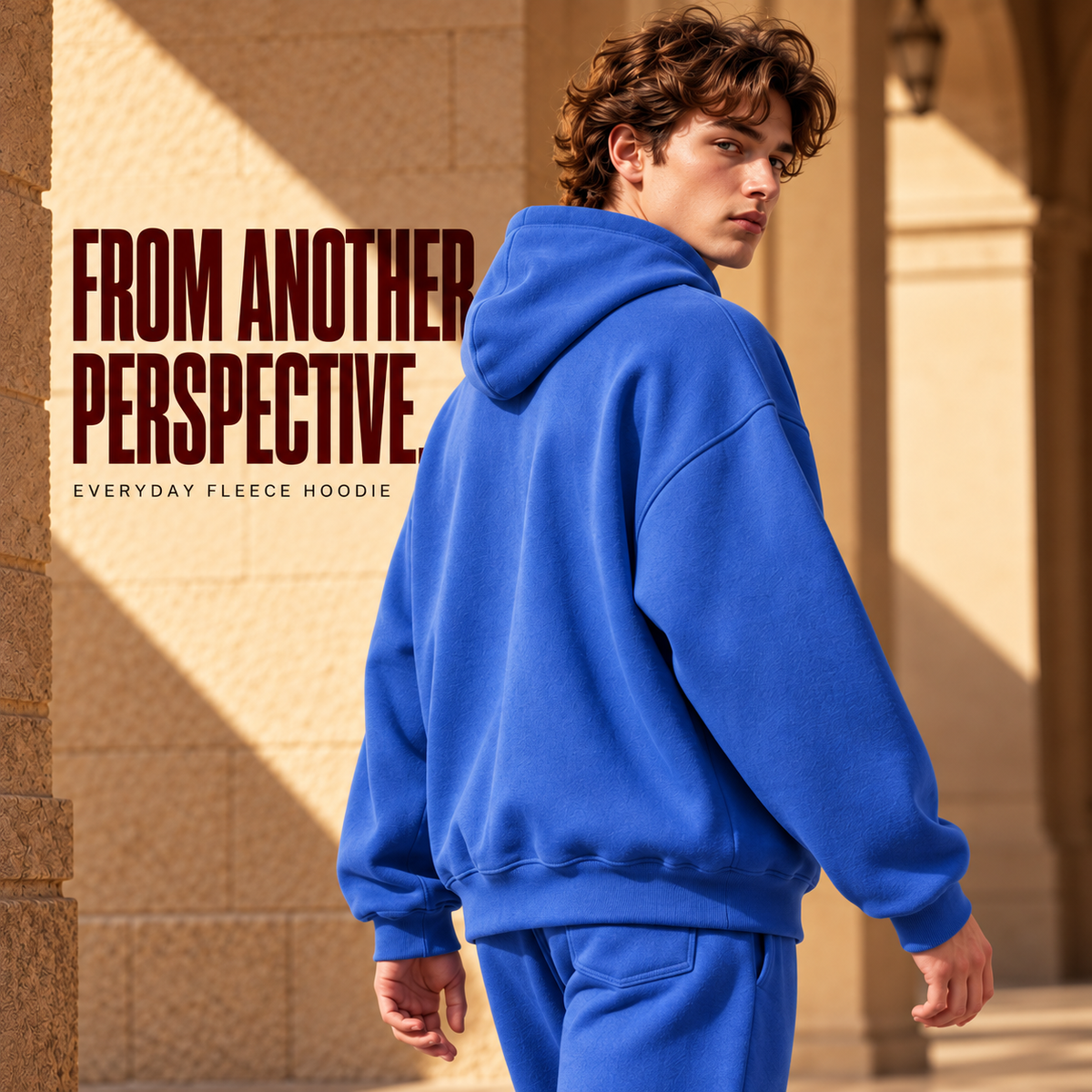 A6042 Bright Blue relaxed plain fleece pullover hoodie, rear or three-quarter styling view