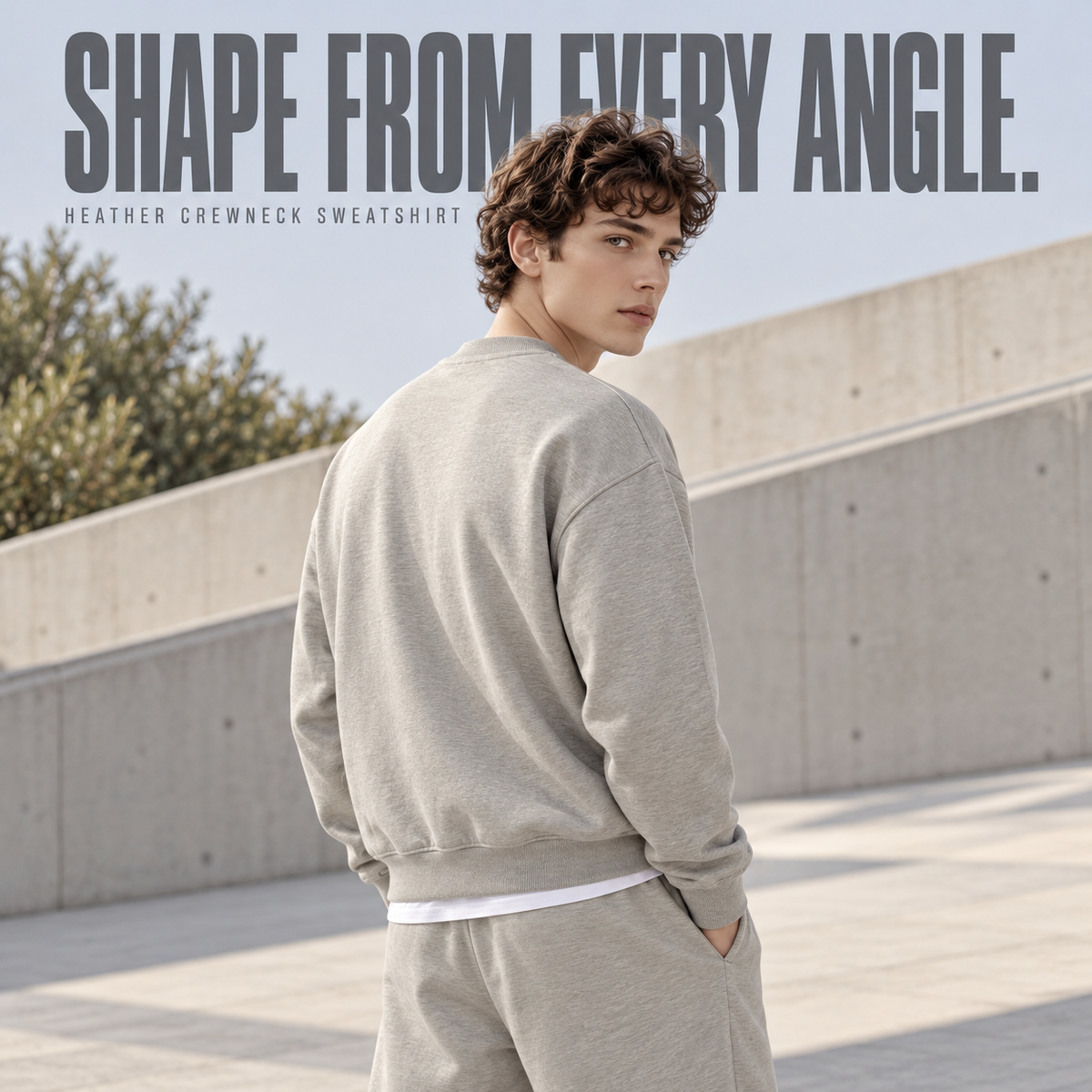 A63362 Oat Grey boxy heather crewneck sweatshirt, rear or three-quarter styling view